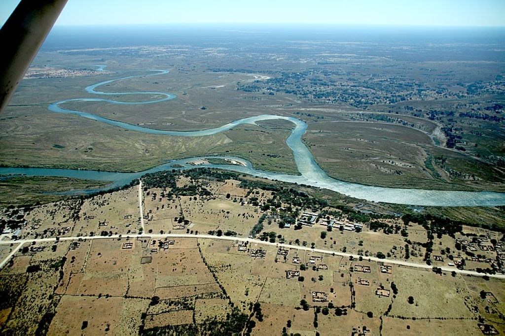 Confluence of Cuito from top and Okavango flowing from left to right Okavango